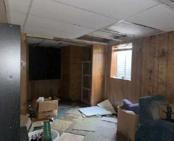 a room with furniture and a window