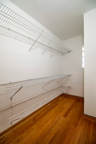 a view of a room with racks on the wall