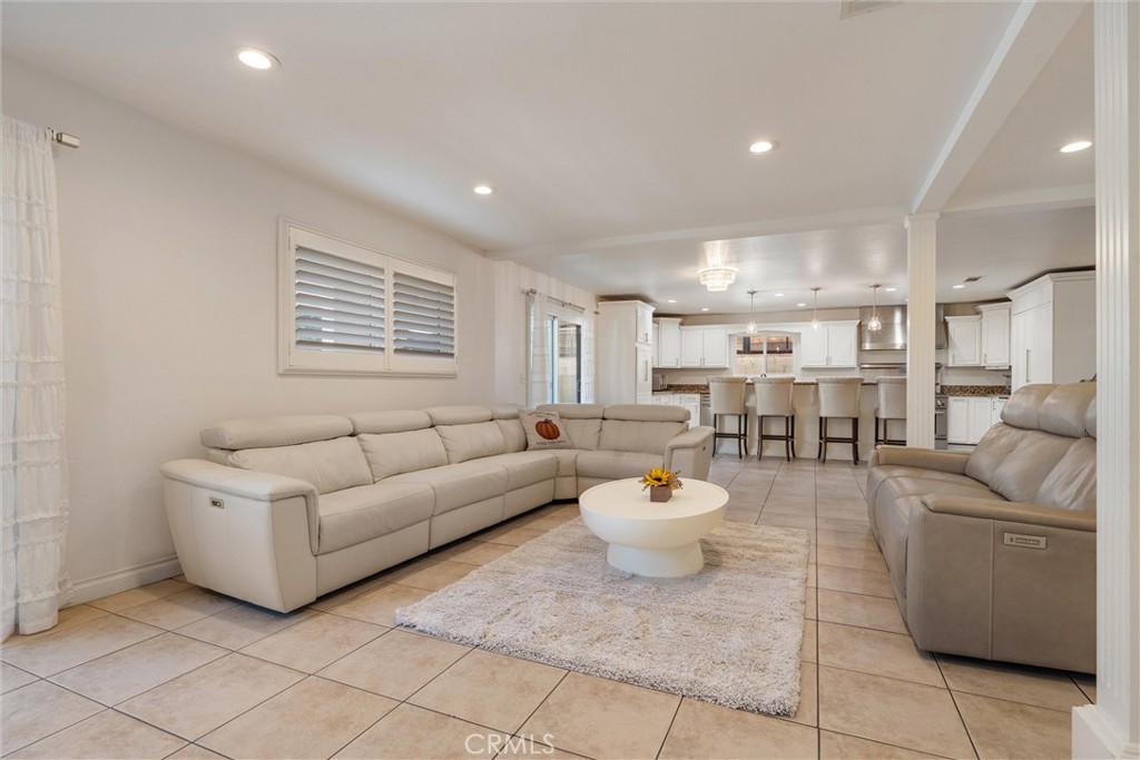 9434 Pico Vista Road Downey, CA 90240 - Photo 15 of 51 a living room with furniture and a large window