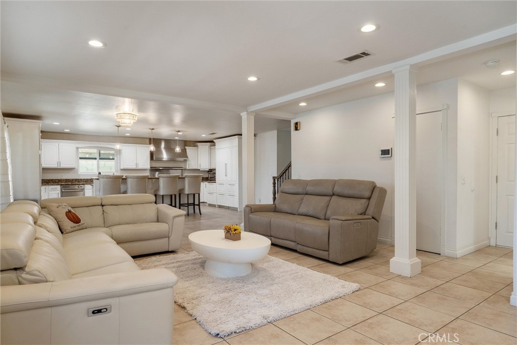 9434 Pico Vista Road Downey, CA 90240 - Photo 17 of 51 a living room with furniture and a view of kitchen