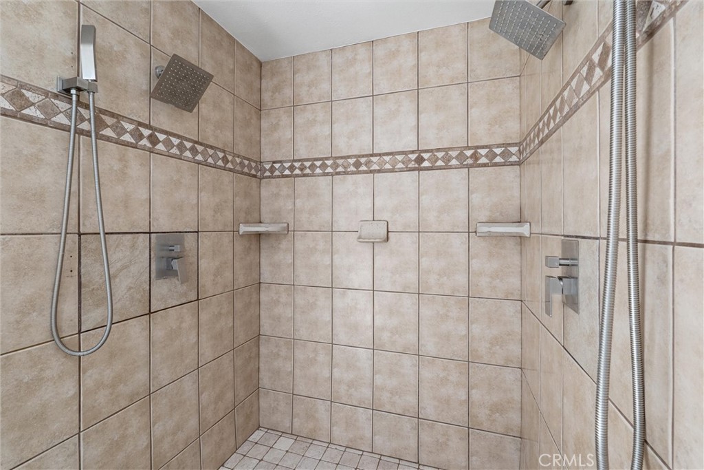 9434 Pico Vista Road Downey, CA 90240 - Photo 30 of 51 a bathroom with a shower