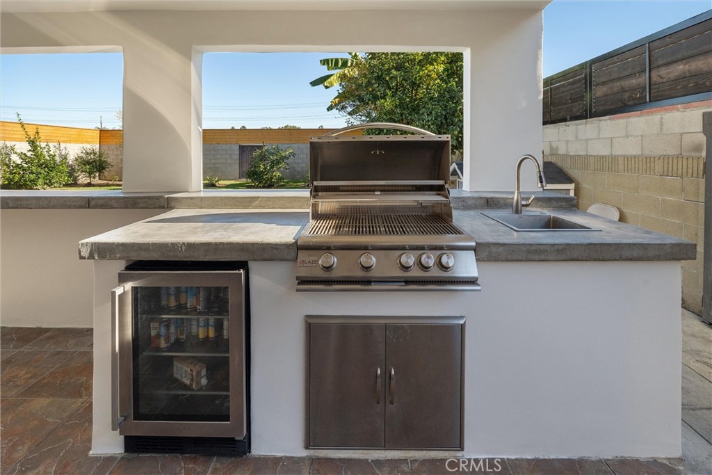9434 Pico Vista Road Downey, CA 90240 - Photo 47 of 51 a stove top oven sitting inside of a kitchen