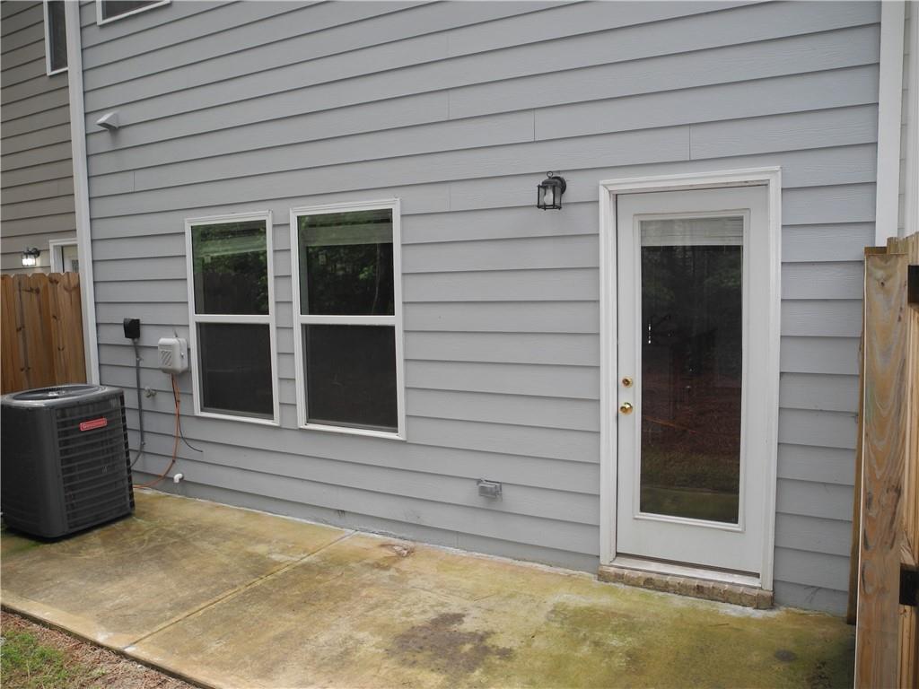 3353 Sable Elm Court Atlanta, GA 30349 - Photo 15 of 18 a view of front door