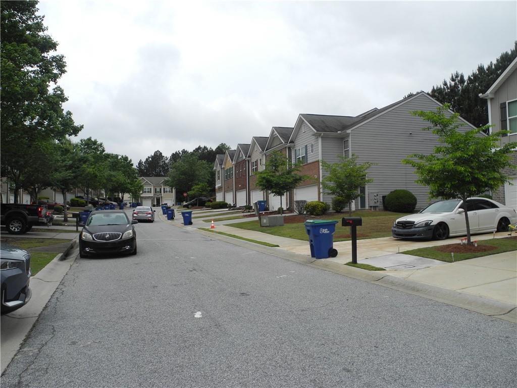 3353 Sable Elm Court Atlanta, GA 30349 - Photo 18 of 18 a view of a street with couches