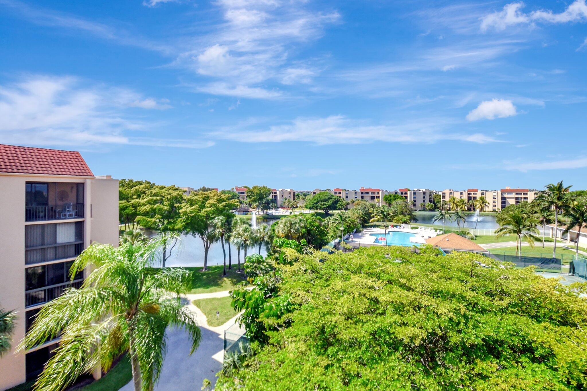 755 Dotterel Road, Unit 1512 Delray Beach, FL 33444 - Photo 45 of 48 a view of a garden with an outdoor space