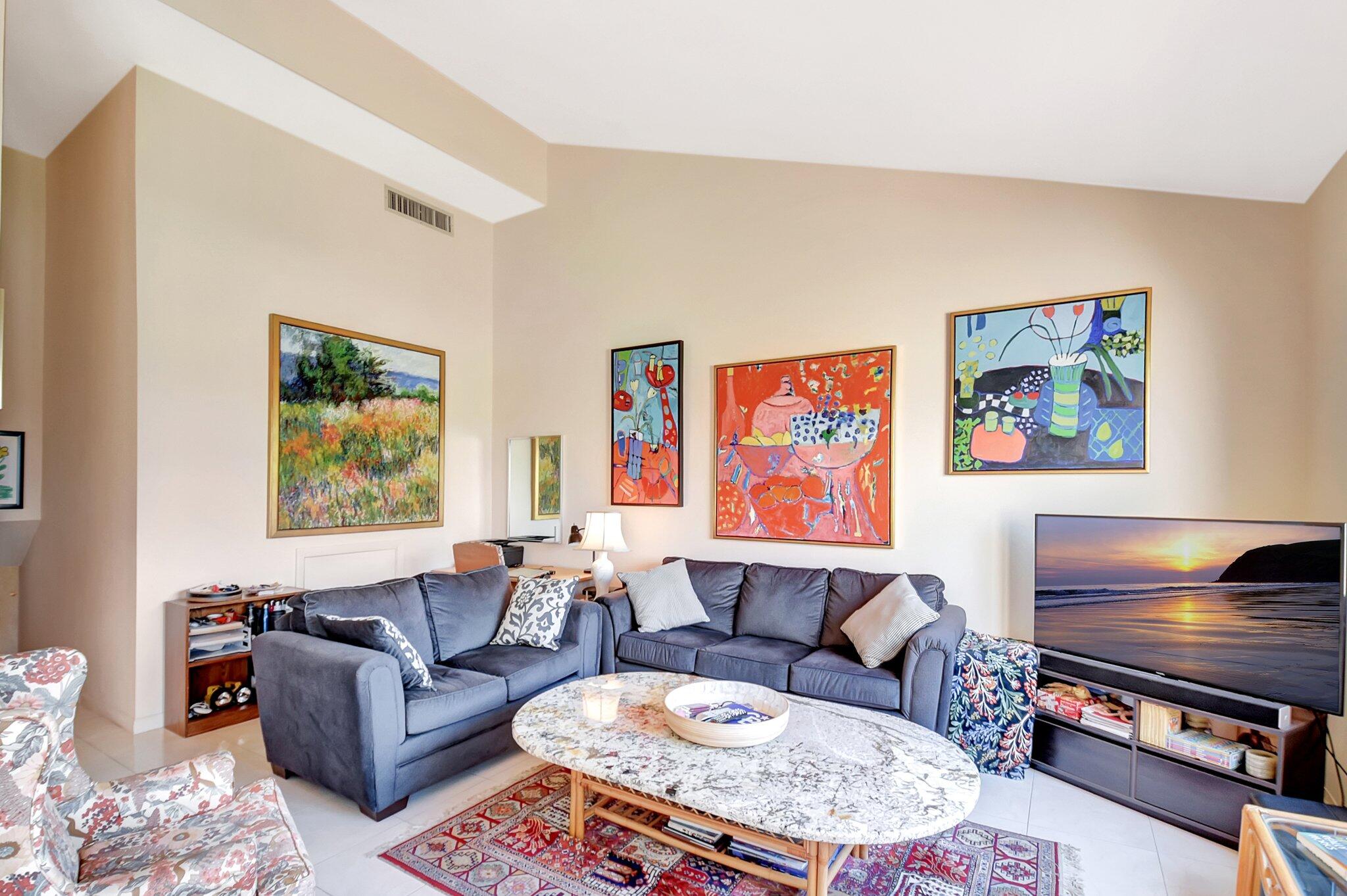 755 Dotterel Road, Unit 1512 Delray Beach, FL 33444 - Photo 9 of 48 a living room with fireplace furniture and a window