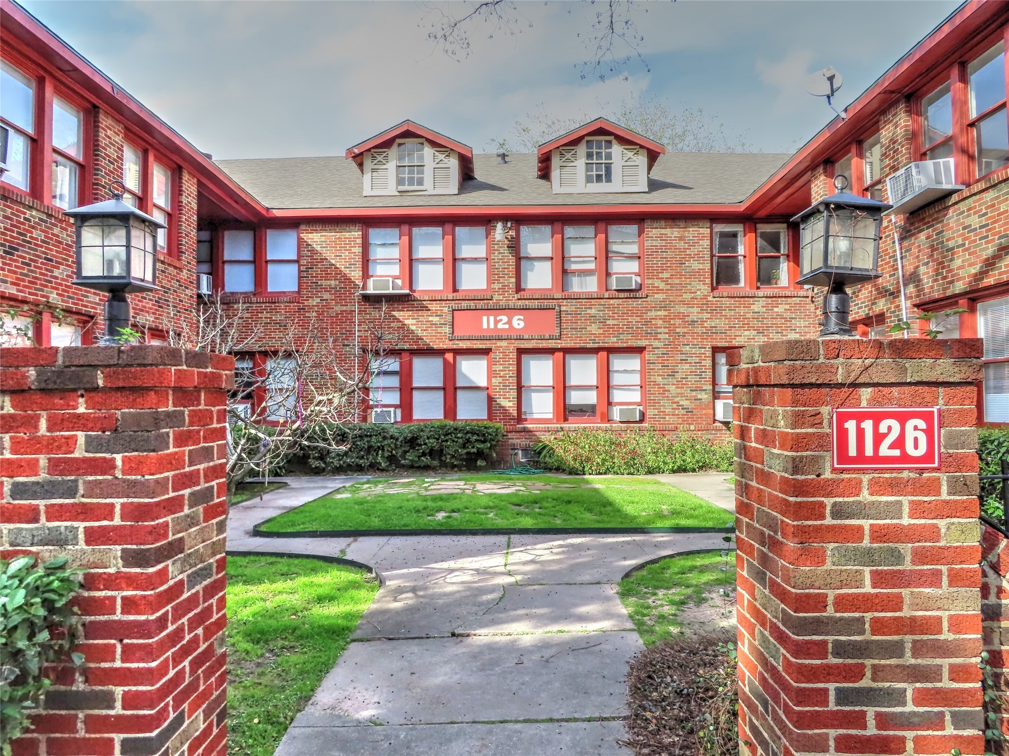 a view of building with yard