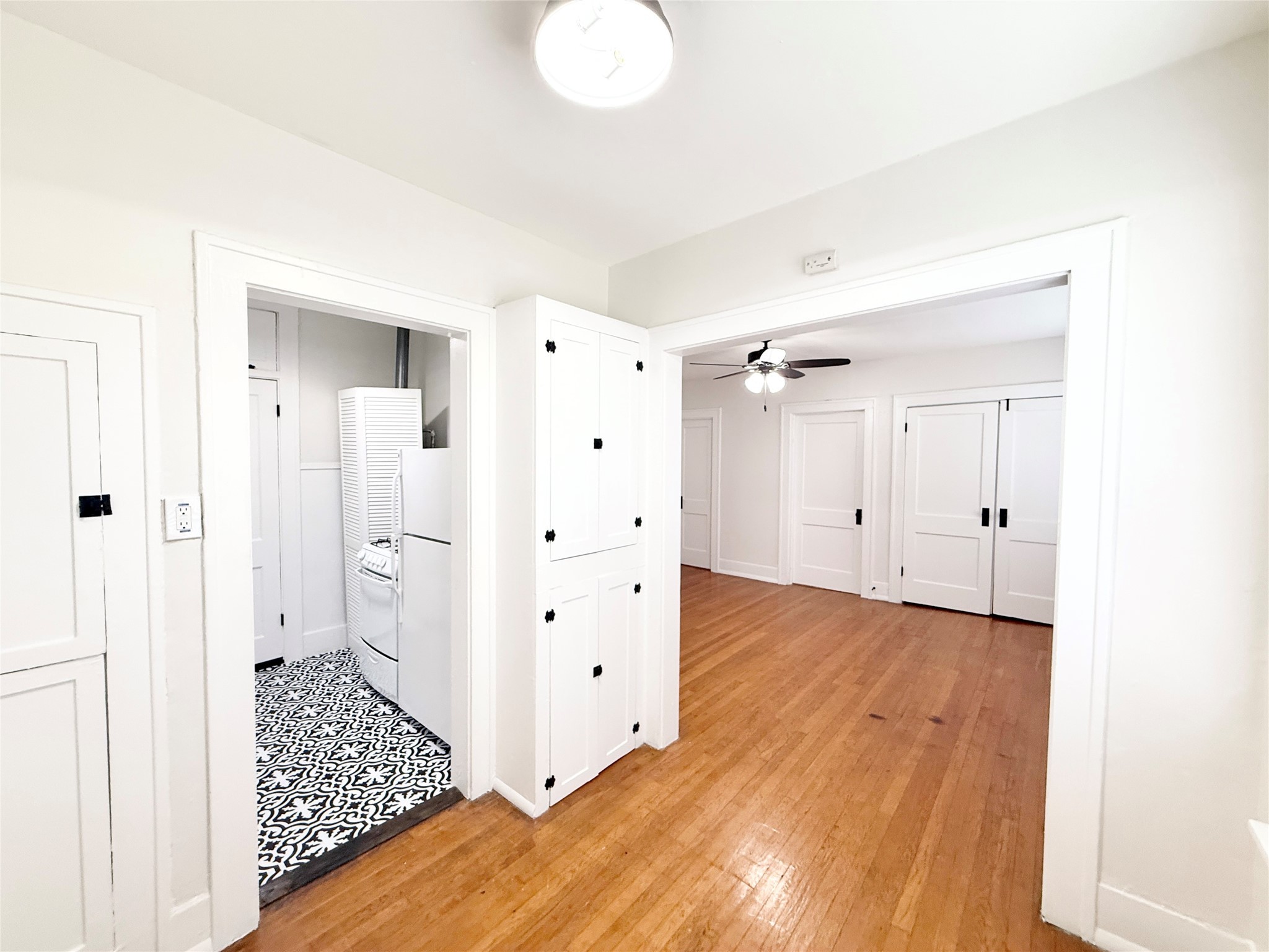1126 Berthea Street, Unit 16 Houston, TX 77006 - Photo 7 of 16 wooden floor in an empty room