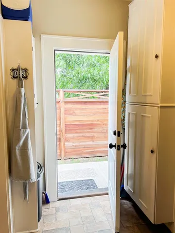 a bed room with a bed and a window