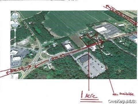 52 Main Road Riverhead, NY 11901 - Photo 3 of 13 a picture of a city view