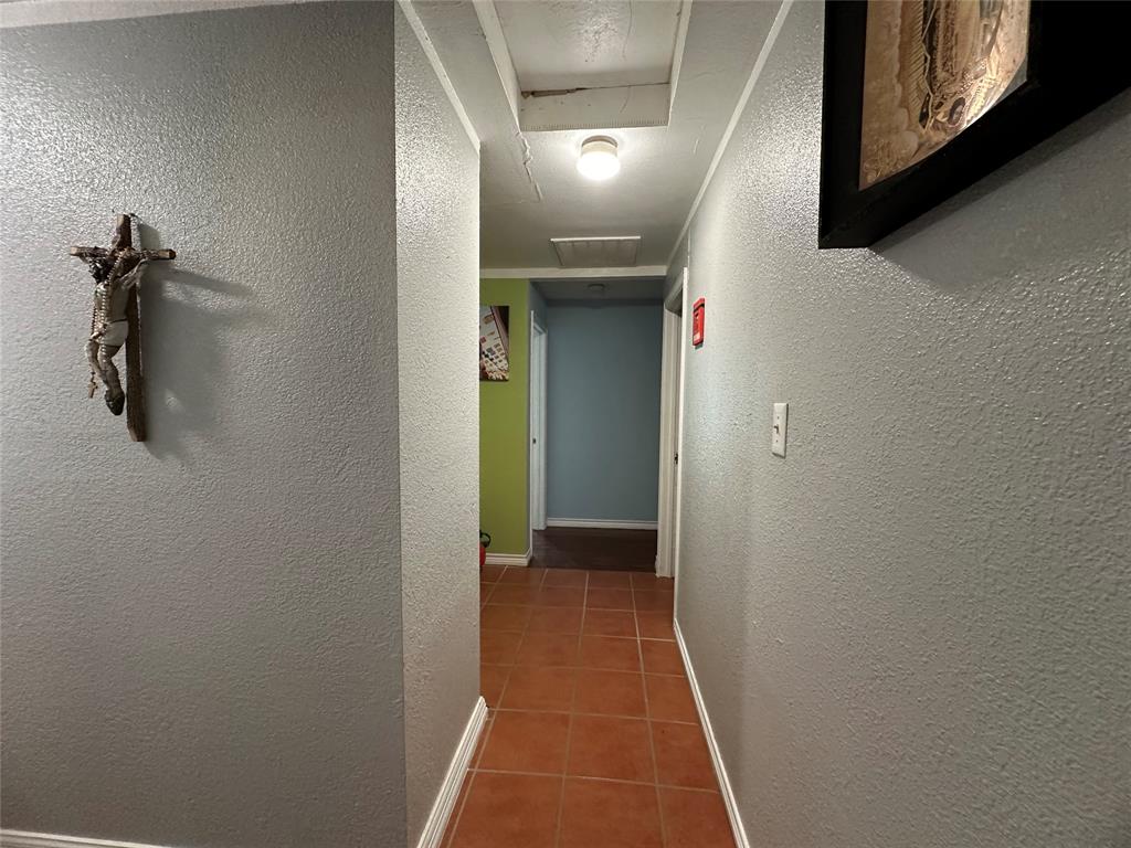 2707 Jim Street Dallas, TX 75212 - Photo 13 of 17 a view of a hallway with closet