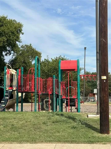 a front view of a house with parking space