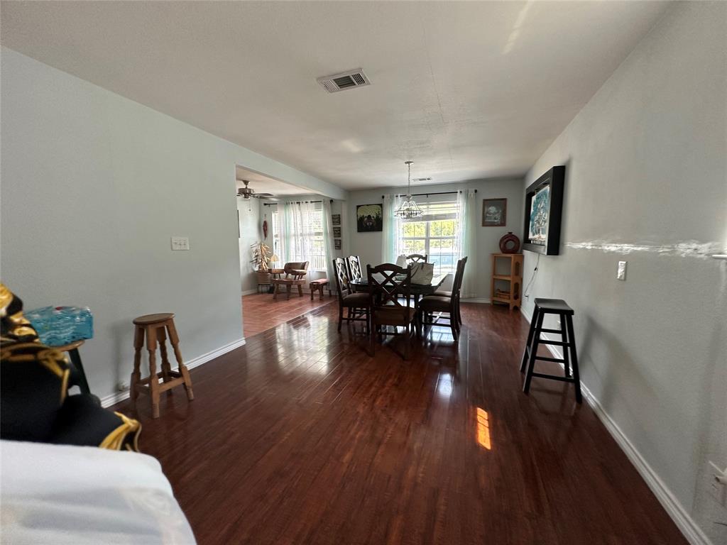 2707 Jim Street Dallas, TX 75212 - Photo 10 of 17 a living room with furniture and wooden floor