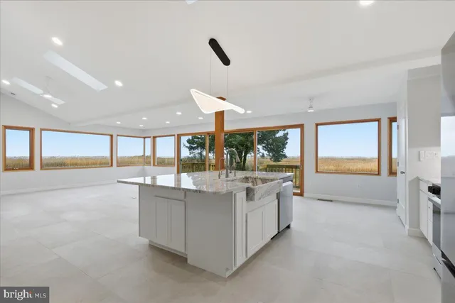 a large living room with a large window