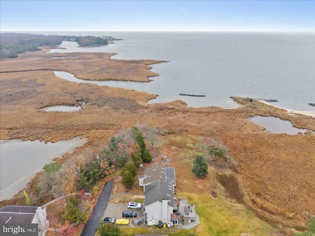 a view of yard with patio