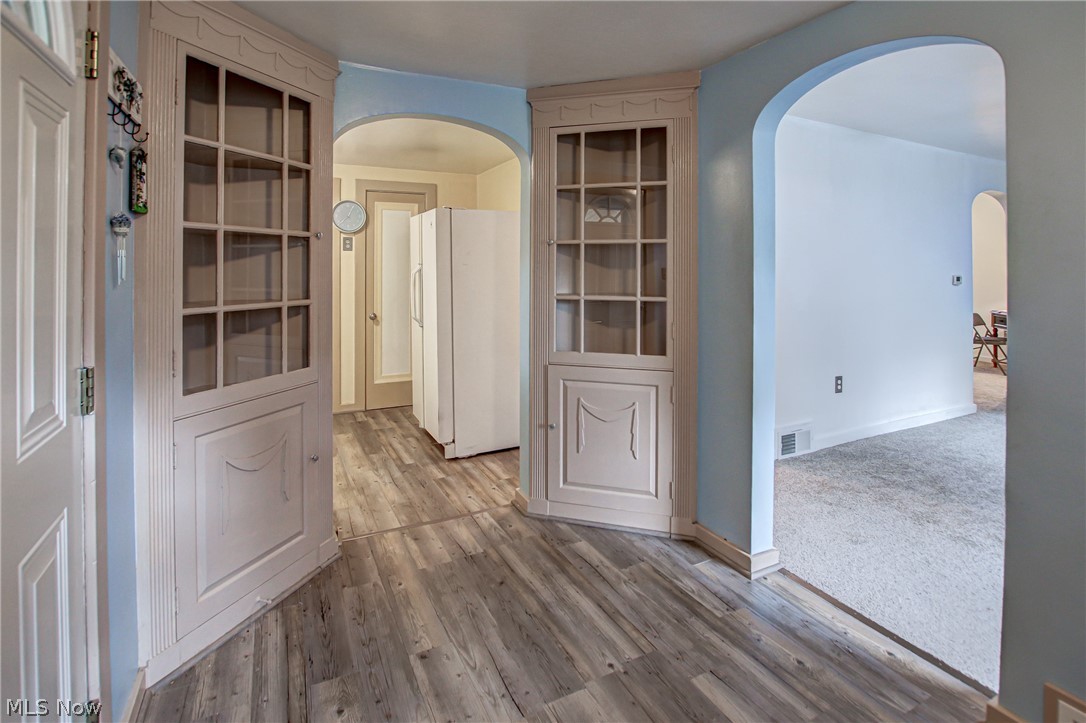 688 Wooster Road North Barberton, OH 44203 - Photo 7 of 47 Dining Room and entry way featuring light wood-type flooring