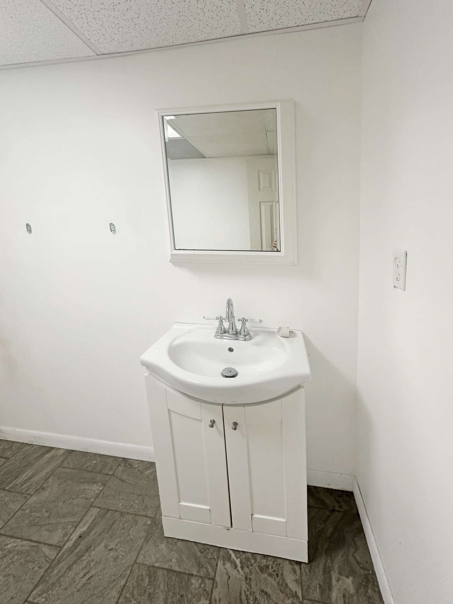 4939 Highway 49 Tennessee Ridge, TN 37178 - Photo 38 of 40 The basement has a full bath with newer updates.