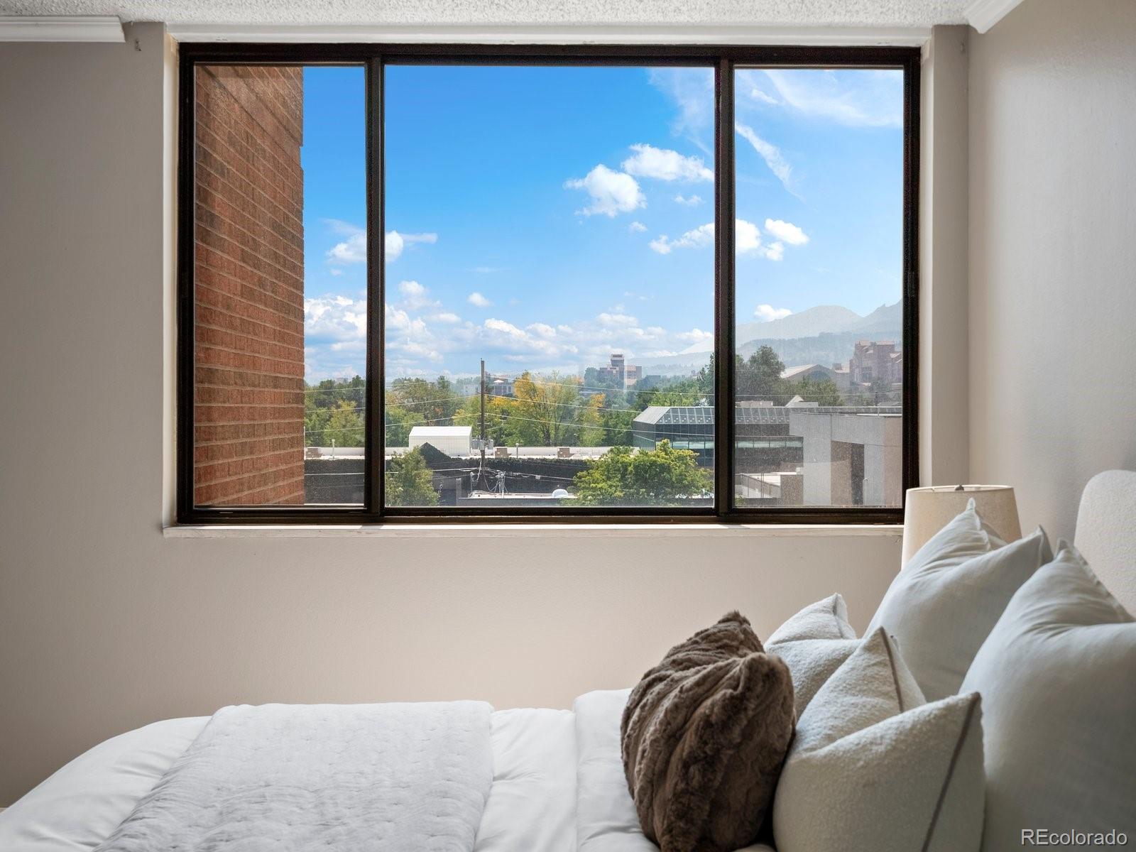1850 Folsom Street, Unit 402 Boulder, CO 80302 - Photo 11 of 28 a view of a glass door with a living room