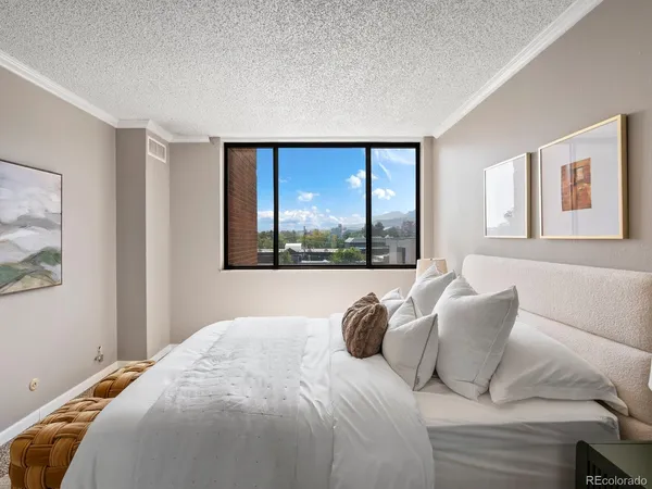 a view of a glass door with a living room