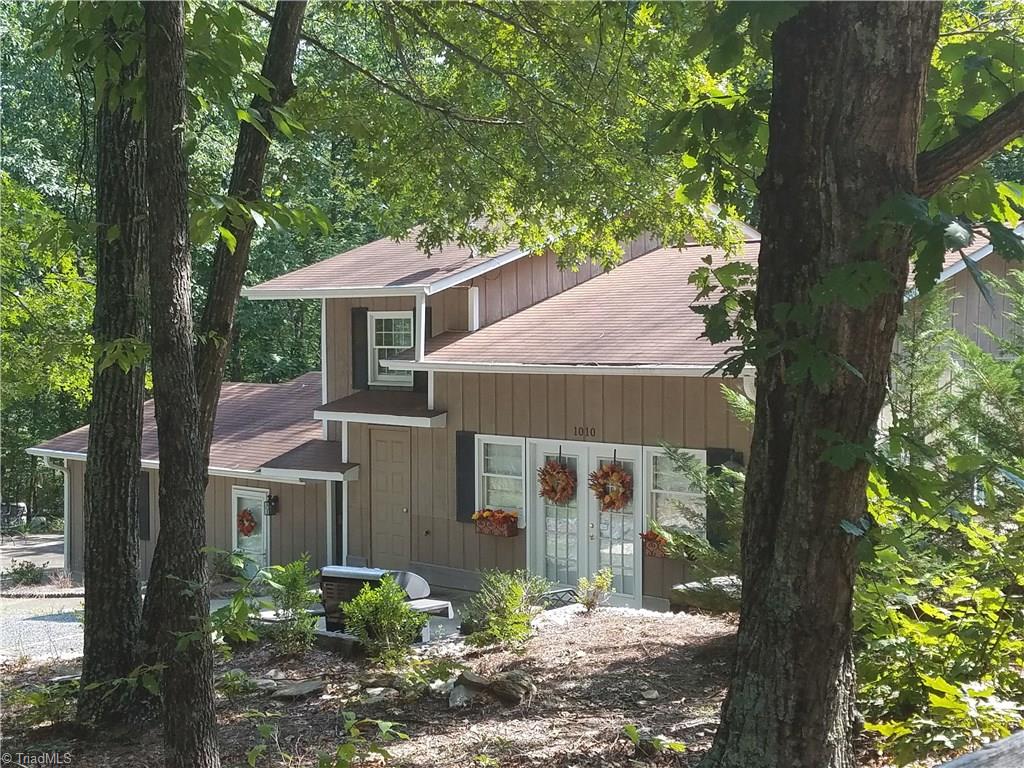 1010 Ivy Road Danbury, NC 27016 - Photo 2 of 27 Nestled in the trees in Danbury NC, "The Love Shack" is a private retreat you will love calling home!