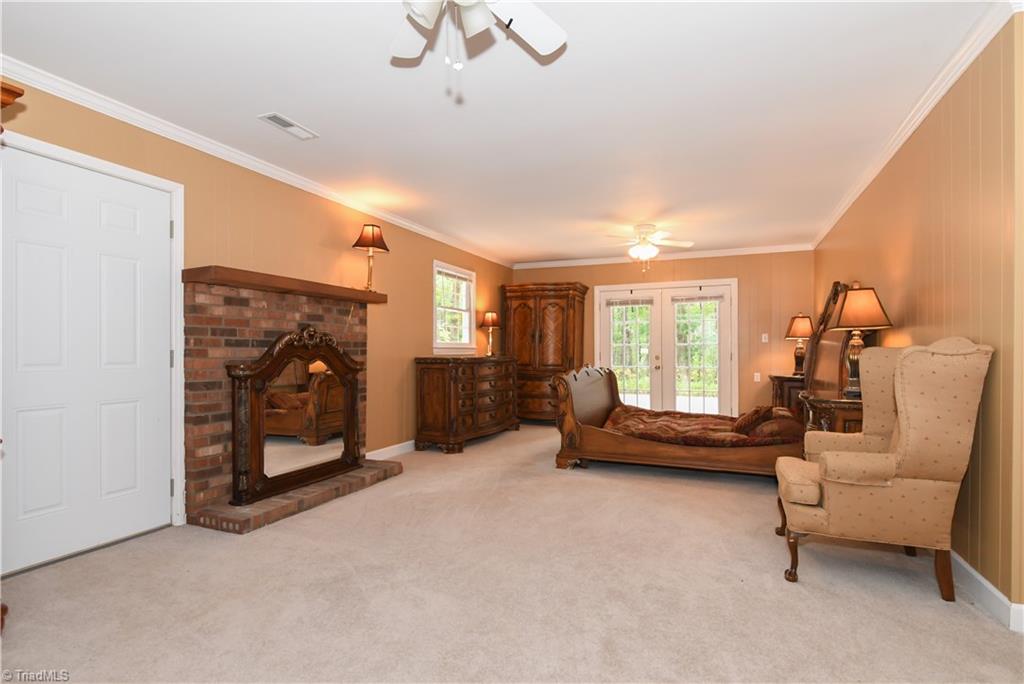 1010 Ivy Road Danbury, NC 27016 - Photo 16 of 27 Downstairs master area is huge, and has a private entrance to the fire pit area and patio.