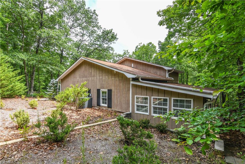 1010 Ivy Road Danbury, NC 27016 - Photo 3 of 27 Privacy and nature are all around this home!