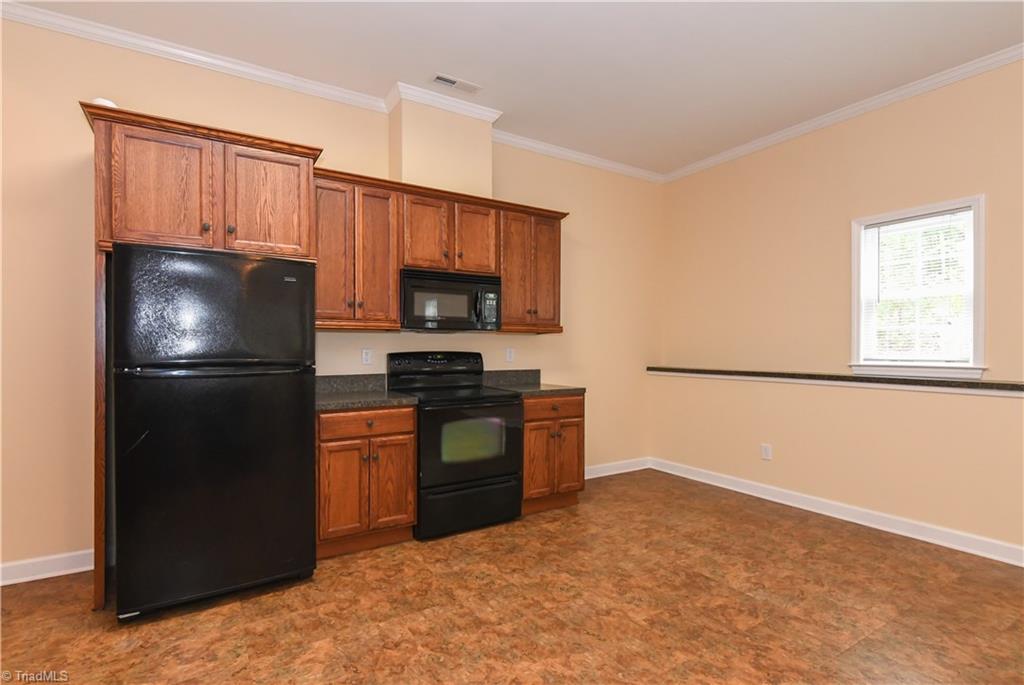 1010 Ivy Road Danbury, NC 27016 - Photo 10 of 27 Fully functional and large kitchen, with plenty of room to add dining furniture.