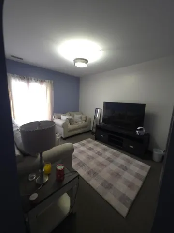 a bathroom with a sink a toilet and a shower