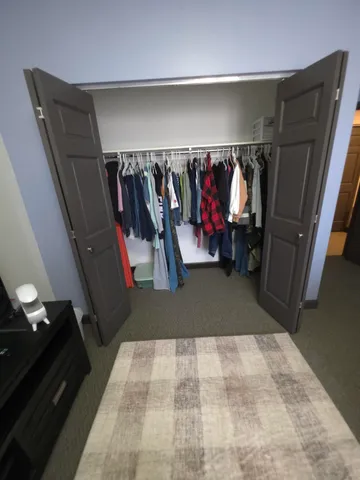a kitchen with table and chairs