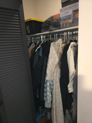 a close up view of a walk in closet