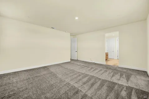 an empty room with an entryway