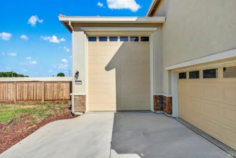 a view of house with backyard