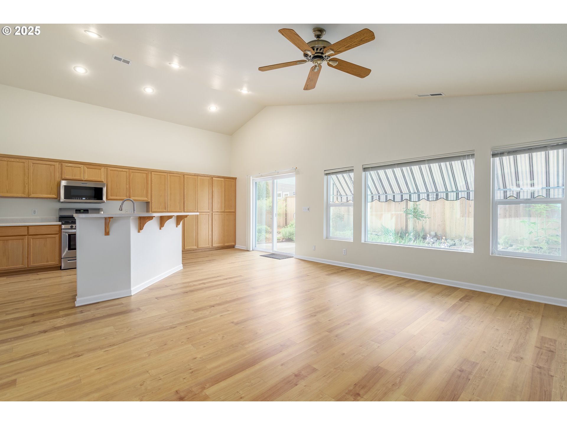5470 Jeffrey Way Eugene, OR 97402 - Photo 11 of 48 a view of a kitchen with a dishwasher and a large window