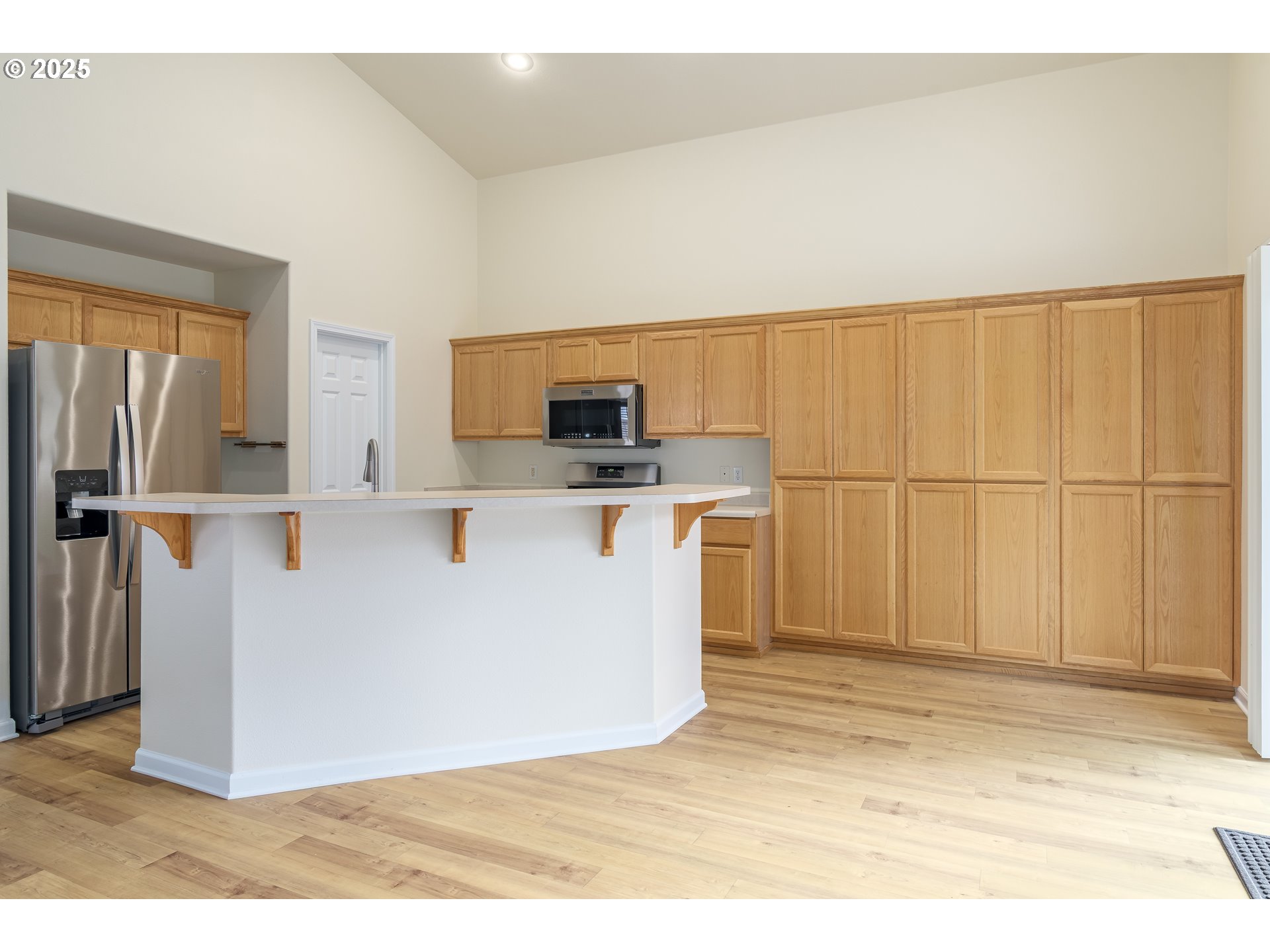 5470 Jeffrey Way Eugene, OR 97402 - Photo 14 of 48 a view of a kitchen with wooden floor
