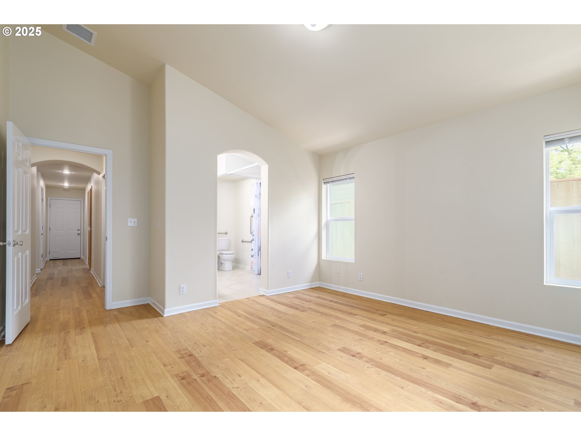 5470 Jeffrey Way Eugene, OR 97402 - Photo 24 of 48 a view of empty room with wooden floor