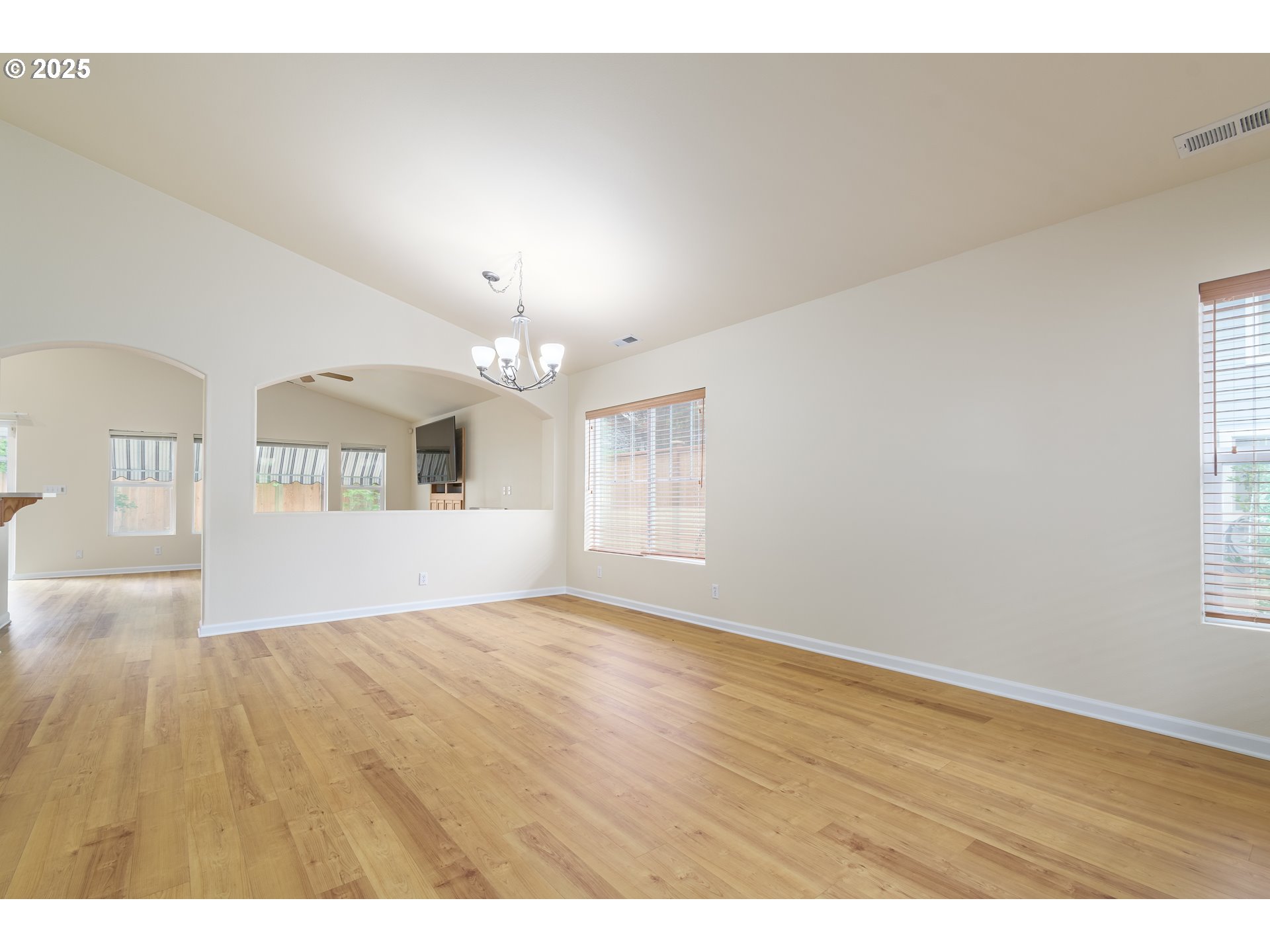 5470 Jeffrey Way Eugene, OR 97402 - Photo 5 of 48 a view of empty room with wooden floor