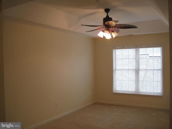 3661 Tavistock Road Frederick, MD 21704 - Photo 3 of 15 a window in an empty room