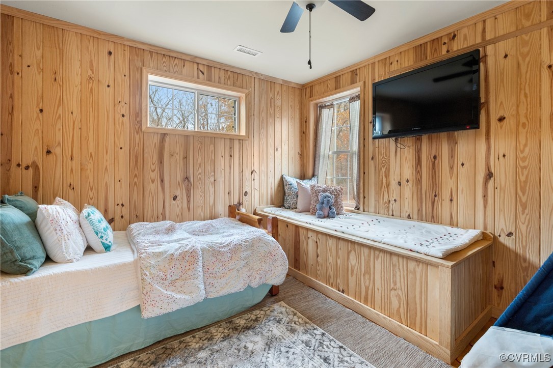 3798 Riddles Bridge Road Goochland, VA 23063 - Photo 24 of 31 a bedroom with a bed and a flat screen tv