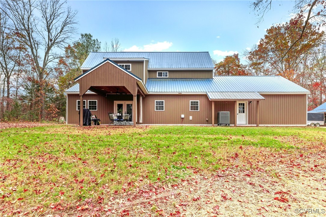 3798 Riddles Bridge Road Goochland, VA 23063 - Photo 28 of 31 a front view of a house with a yard and garage