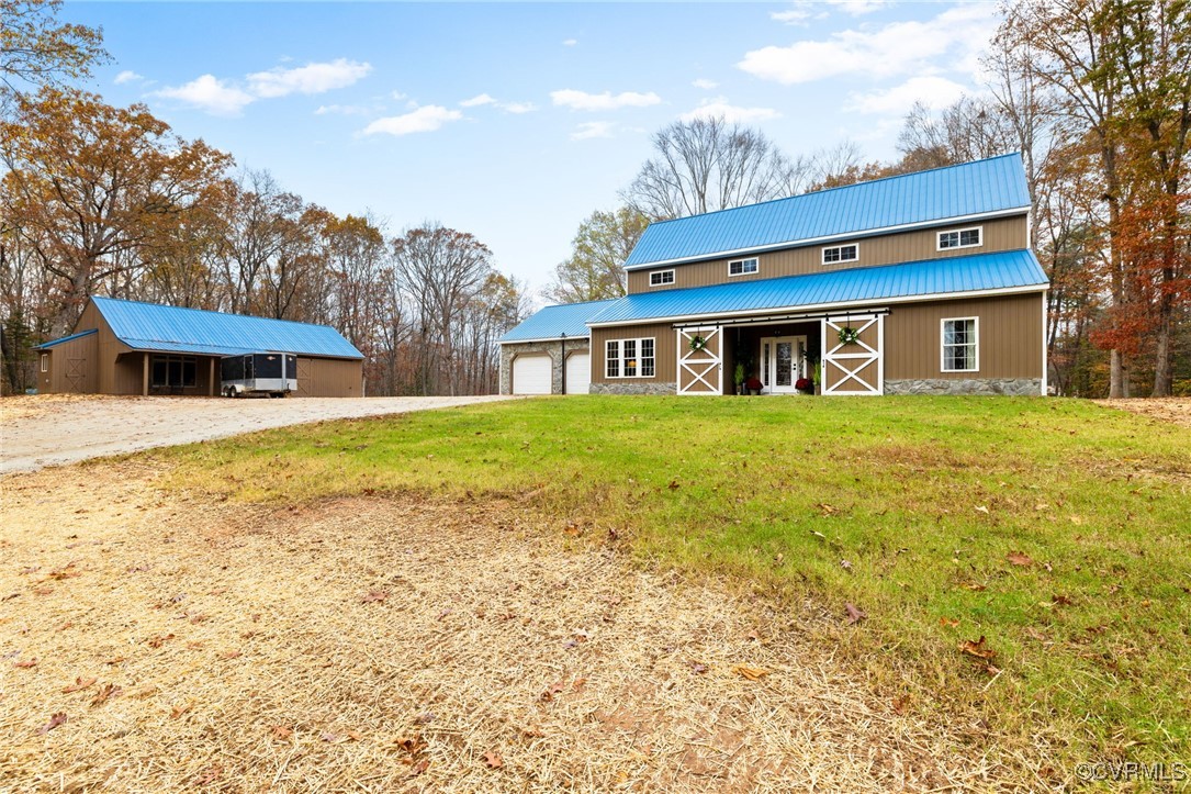 3798 Riddles Bridge Road Goochland, VA 23063 - Photo 31 of 31 a view of a house with a yard