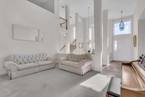 a living room with furniture and a couch