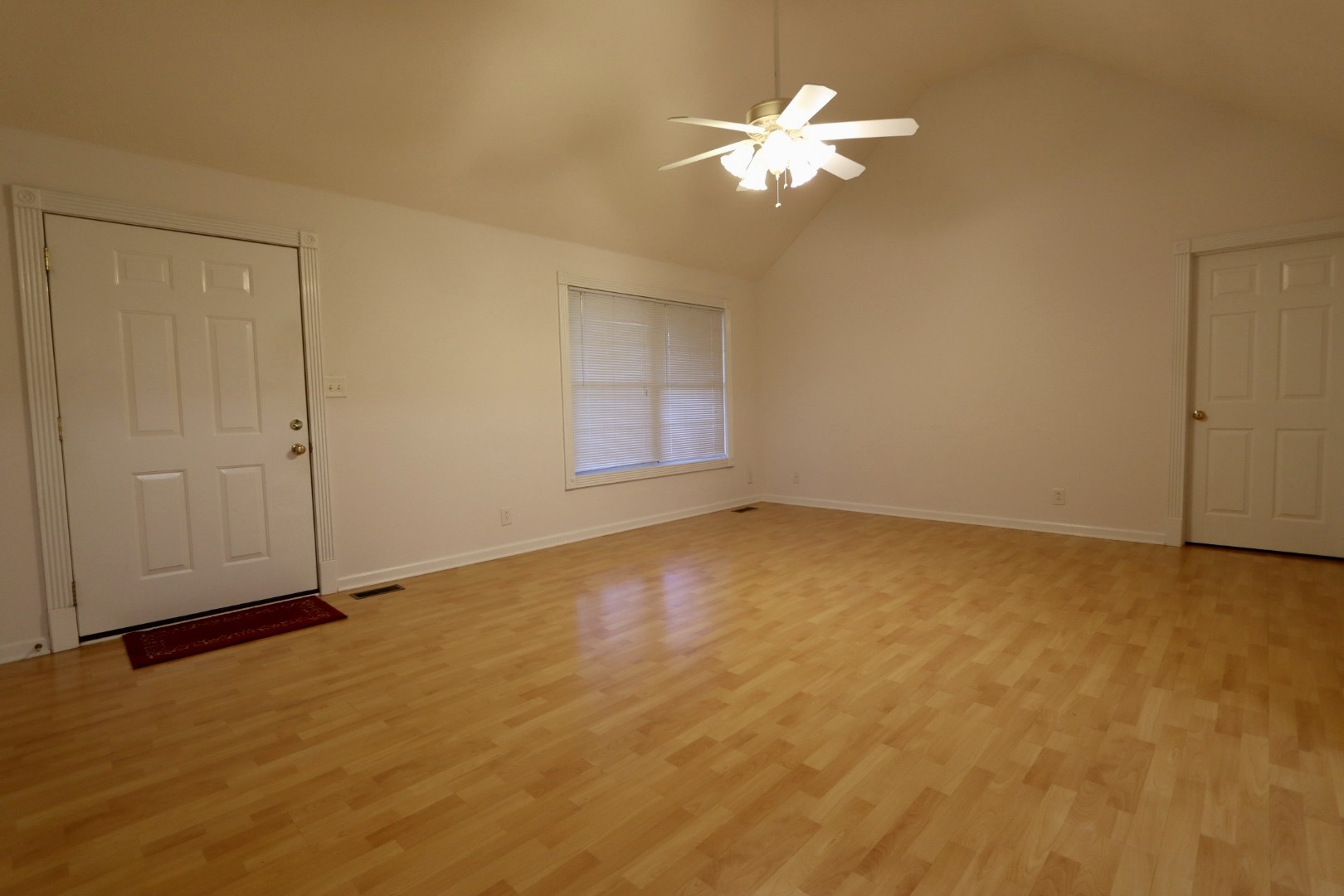 1462 Lock B Road South Clarksville, TN 37040 - Photo 2 of 25 an empty room with a view of a room
