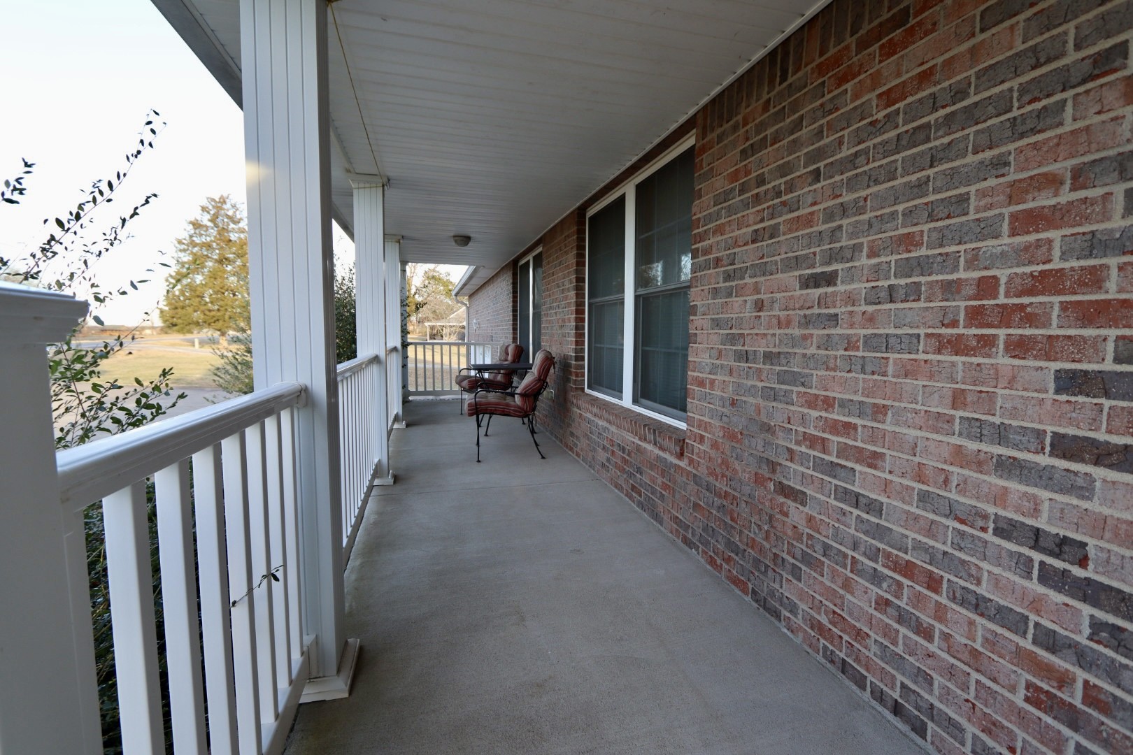 1462 Lock B Road South Clarksville, TN 37040 - Photo 21 of 25 a view of a porch with wooden floor