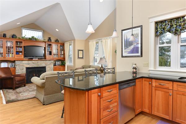 38 Jenness Street Quincy, MA 02169 - Photo 15 of 23 a living room with fireplace furniture and a flat screen tv