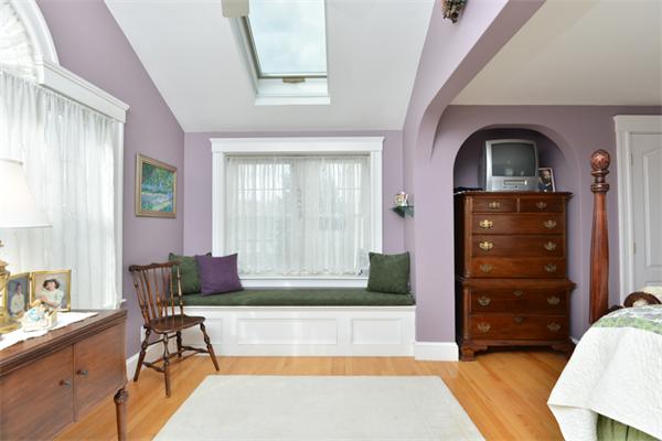 38 Jenness Street Quincy, MA 02169 - Photo 19 of 23 a living room with furniture and a window