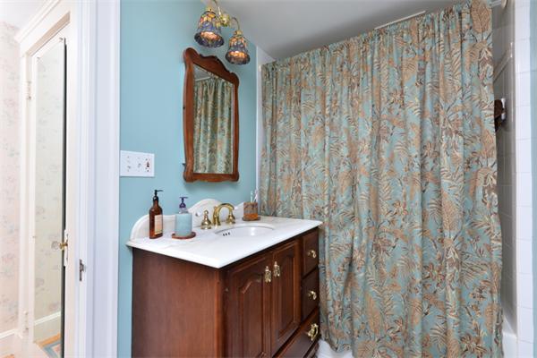 38 Jenness Street Quincy, MA 02169 - Photo 20 of 23 a bathroom with a sink vanity and mirror