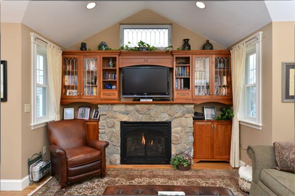 38 Jenness Street Quincy, MA 02169 - Photo 10 of 23 a living room with furniture and a fireplace