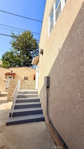 a view of entryway with a front door