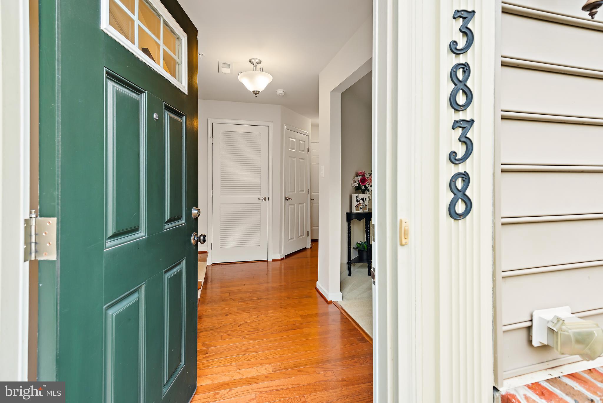 3838 Cullingworth Road Burtonsville, MD 20866 - Photo 19 of 69 a view of a hallway with wooden floor and entryway