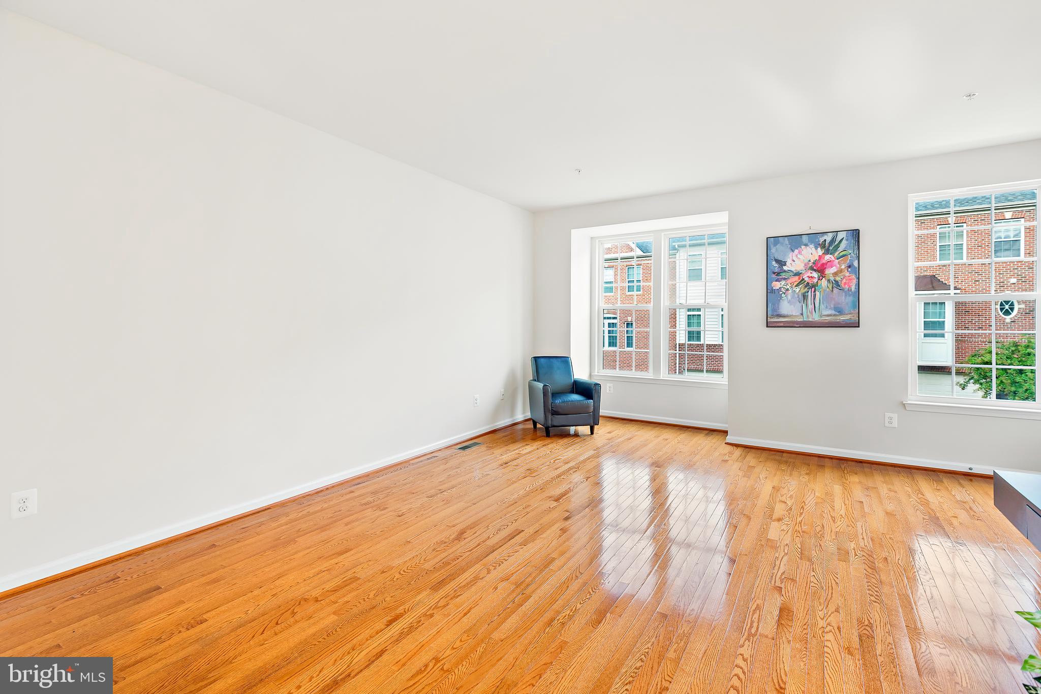 3838 Cullingworth Road Burtonsville, MD 20866 - Photo 38 of 69 an empty room with wooden floor and windows